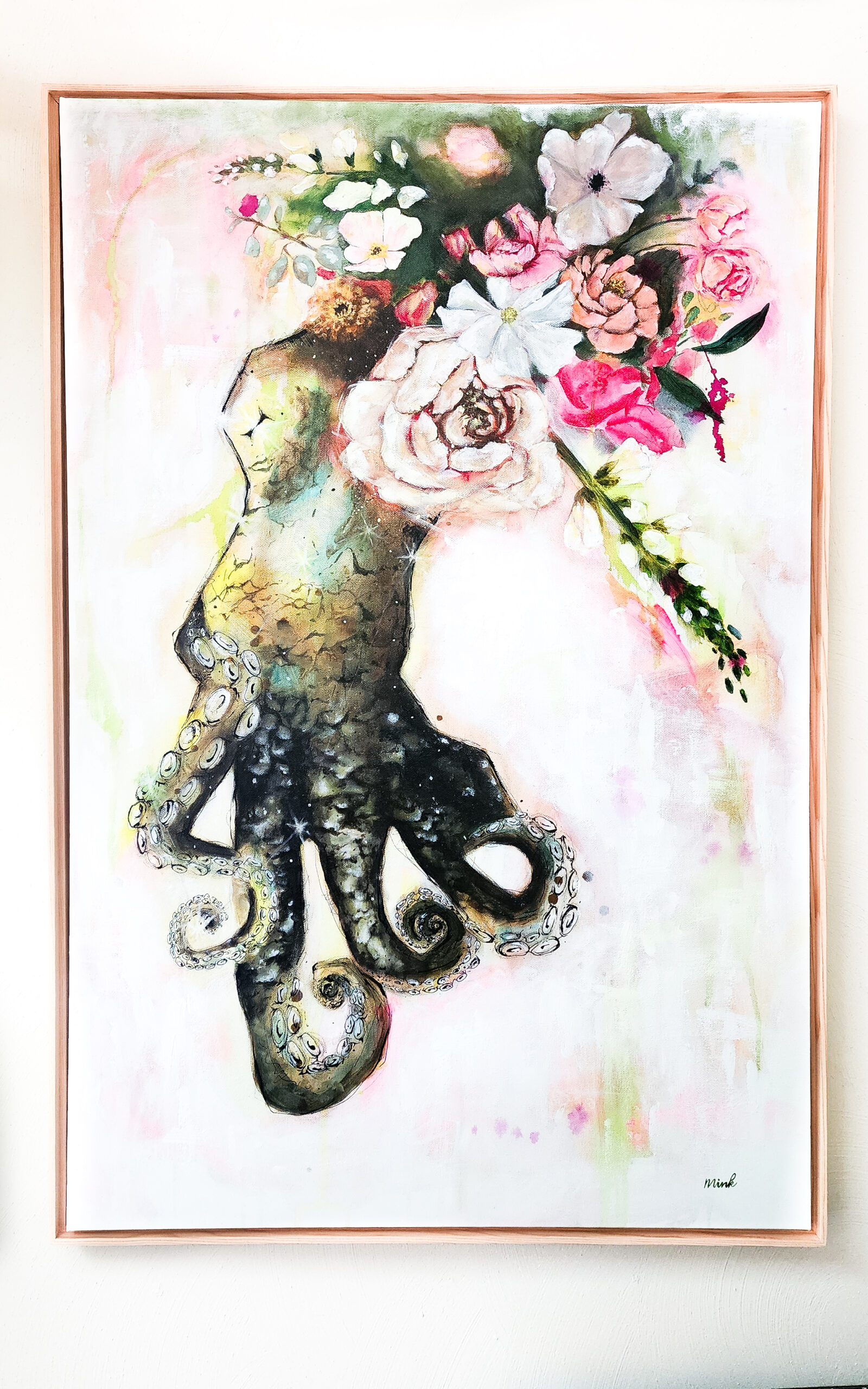 Large canvas painting of an octopus with floral art.